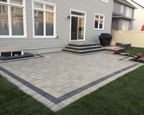 Pavers Around Deck, Backyard Step Down Patio Ideas, 2 Level Paver Patio Ideas, Step Down Patio Backyards, Patio Along Back Of House, Interlock Patio Backyard Small, Pacer Patio Ideas, Patio Stone Steps, Backyard Concrete Patio Ideas With Steps