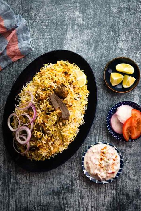 Mutton Biryani Recipe - The Hyderabadi dum biryani recipe is made by layering and cooking meat and rice with lots of flavors. It's simple and I have broken down into steps that will help you to make it without the overwhelming feeling. Making Mutton Biryani wouldn't get any easier!!! Mutton Biryani Recipe, Quinoa Fruit Salad, Dum Biryani Recipe, Rice Photography, Romantic Breakfast, Mutton Biryani, Grilled Prawns, Dum Biryani, Bengali Food