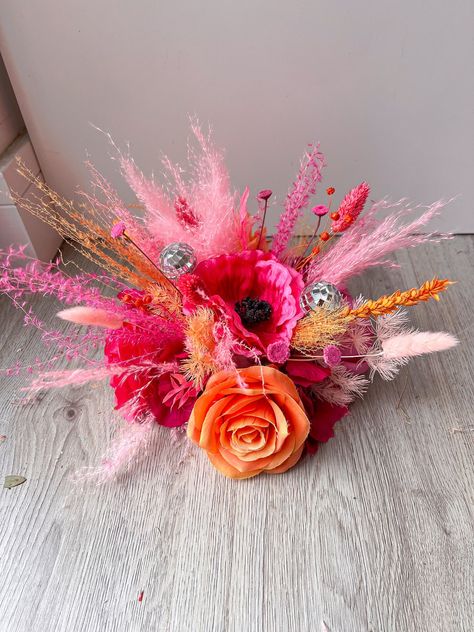 This Wedding Centerpieces item by BohoBackdropsUK has 79 favorites from Etsy shoppers. Ships from United Kingdom. Listed on Sep 16, 2024 Flower Bouquet Table Decoration, Floral Arrangement With Feathers, Disco Wedding Bouquet, Pink And Orange Florals, Disco Ball Bouquet, Red Pink Orange Wedding, Pink And Orange Party Decor, Disco Ball Flower Arrangements, Pink And Orange Flower Arrangements