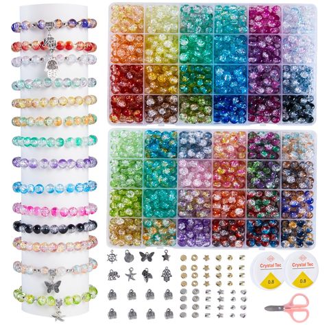 PRICES MAY VARY. 【About This Glass Beads Kit 】 The crackle glass beads bracelet making kit comes with more than 1300 pcs of round glass beads with holes in 48 crackle colors, 120pcs gold spacer beads,120pcs silver spacer beads,16pcs silver metal charm pendants,2pcs crystal elastic strings and 1 scissors,enough quantity to meet your various needs of jewelry making or DIY craft. 【Unique cracked & Vibrant colors】48 style cracked glass beads are made of high glass which produce random unique crackin Crackle Glass Bead Bracelet, Bracelet Making Kit Beads, Bracelet Maker, Making Jewelry For Beginners, Beads Kit, Diy Kandi Bracelets, Small Bead Bracelet, Beads For Bracelets, Bracelet Making Kit