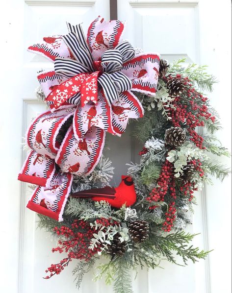 Traditional Christmas Greenery, Pinecones, Berries on a grapevine wreath. Beautiful ribbon bow and a cardinal embellishment. Christmas Wreaths With Cardinals, Cardinal Christmas Wreath, Cardinal Wreath Ideas, Christmas Front Door Decor Entrance, Cardinal Wreaths, Chrismass Decore Ideas, Cardinal Crafts, Christmas Greenery Wreath, Christmas Front Door Decor