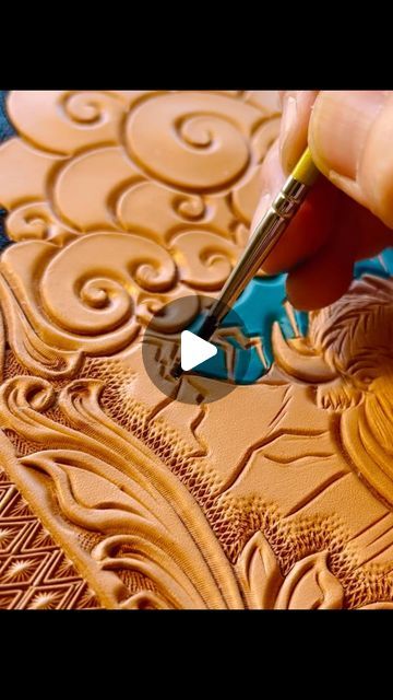 Clair Kehrberg Leatherworks on Instagram: "I think I am finally down painting…..  #clairkehrbergmaker #maker #westernstyle #handmade #leather #cowgirlstyle #leathergoods #painting #paint #art #makeart #westernart #storm #buffalo #progress #howitsmade #homedecor #westernhome #westernlifestyle #westernboutique #etsyartist #etsyhandmade #leatherart #leatherartisan #leatherdesign" Leather Painting Tutorial, Leather Stamping Patterns, Leather Tooling Patterns, Tooling Patterns, Indian Paintbrush, Western Boutique, Western Homes, Leather Artisan, Leather Cuts