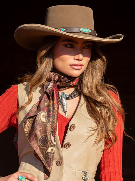 Wild Rag is a term used by the old cowboys for their bandanas or western scarves. Our paisley print come in great colors, peach paisley, ranch red, powder blue, and turquoise and rust. Perfect cowgirl gear to match any ranch wear. They are a natural insulator that is warm, breathable, and wicks away moisture. I wear one everyday to protect my neck from the sun or cold. Each 100% silk Wild Rag is sewn with a machine roll-stitched hem that will last! Sold in 22 and 36 inch lengths. Handkerchief Tied Around Neck, Vintage Western Women, Western Outfits With Wild Rags, Midland Aesthetic, Fancy Western Outfits Women, Boho Cowgirl Outfits, Women Bolo Tie Outfit, Easy Cowgirl Outfits, Western Scarf Outfits