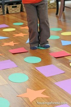 Shape hopscotch - Indoor Games for Kids: The school has vinyl shapes that could be used for this game. Maybe make dice to use with this to have students roll to know where to jump. Indoor Activities For Toddlers, Indoor Games For Kids, Shapes Preschool, Gross Motor Activities, Shapes Activities, Games Activities, Preschool Lessons, Indoor Games, Toddler Learning Activities