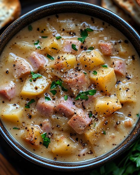 🍲 𝗖𝗿𝗲𝗮𝗺𝘆 𝗛𝗮𝗺 𝗮𝗻𝗱 𝗣𝗼𝘁𝗮𝘁𝗼 𝗦𝗼𝘂𝗽 🥔🍖 A hearty and comforting soup packed with tender potatoes, ham, and veggies in a creamy broth. 🛒 Ingredients: 8 cups russet potatoes, diced 1 yellow onion, diced 2 large carrots, peeled and chopped 1/2 cup chopped celery 16 oz cubed ham 1 tsp kosher salt 1/4 tsp coarse ground black pepper 1/4 cup flour 4 cups chicken broth 1 1/2 cups heavy cream (or whole milk) 1/2 cup sour cream 👩‍🍳 Instructions: 1️⃣ Cook the vegetables: In a large pot, add diced potatoes, ... Scalloped Potatoes And Ham With Cream Of Chicken Soup, Cubed Ham, Ham And Potato Soup, Comforting Soup, Random Recipes, Diced Potatoes, Russet Potatoes, Crusty Bread, Potato Soup