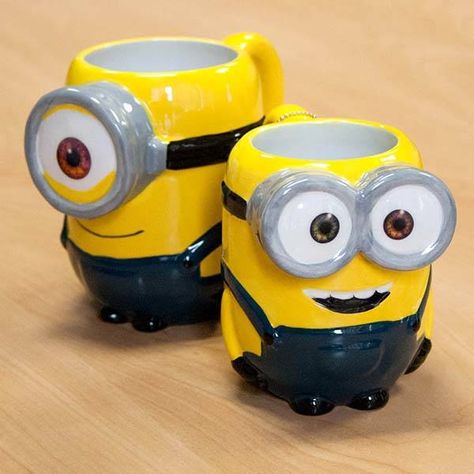 The 3D Minion Coffee Mug Likes Your Coffee Instead of Bananas ... Mugs Out Of Clay, Cool Ceramic Mugs, Two Minions, Diy Coffee Mugs, 3d Mugs, Bob Minion, Disney Coffee Mugs, 3d Mug, Banana Coffee