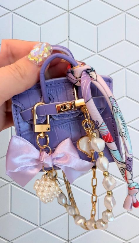 Purse With Charms Aesthetic, Luxury Bags With Key Leash For Everyday Use, Luxury Bags With Key Leash, Cute Purple Shoulder Bag For Gift, Cute Purple Shoulder Bag Gift, Small Everyday Bags With Interior Key Chain Holder, Rectangular Coin Purse With Key Leash As Gift, Trendy Rectangular Bag Charm Gift, Purple Shoulder Bag With Detachable Strap As Gift