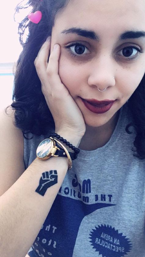 Minimalist Black Lives Matter Tattoo -- black power fist on wrist for women or men Interracial Tattoos, Black Power Tattoo For Women, Blm Tattoo Ideas, Black Power Tattoo, Black Lives Matter Tattoo, Black Culture Tattoos, Serious Tattoos, Tattoo Covering, Equality Tattoos