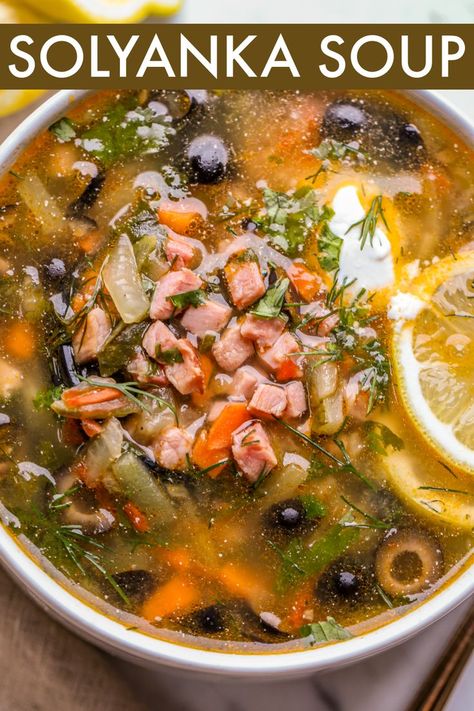 An easy Traditional Solyanka Soup Recipe. The hearty soup is loaded with ham, pickles, and olives served with fresh dill and sour cream. The soup joins our Beet Borscht for traditional Russian soup recipes. Russian Soup Recipes, Solyanka Soup, Beet Borscht, Borscht Soup, Eastern European Recipes, Beet Soup, Quick And Easy Soup, Hearty Soup, Best Soup Recipes