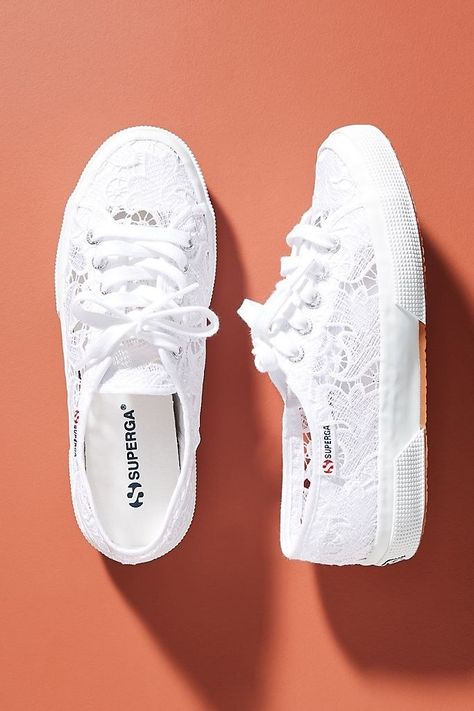 A dreamy pair of low-top Superga lace sneakers — you can literally never have too many of these. They're perfect for any occasion, at any time, or any weather. Wedding Tennis Shoes, Bride Sneakers, Bridal Sneakers, Superga 2750, Wedding Sneakers, Mini Logo, Lace Sneakers, Bride Shoes, Logo Tag