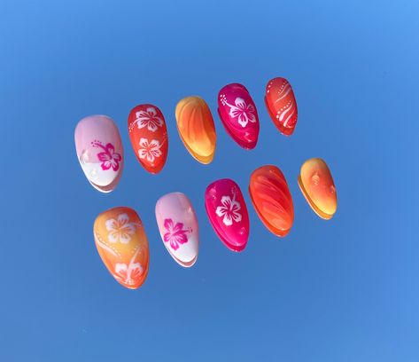 **PLEASE READ FOR IMPORTANT INFO AND SIZING** Stunning nails with cute hibiscus flowers, beautiful gradients in bright summer colors, and intricate 3D water details. They bring the Hawaiian surfer girl vibes and are perfect for your next beach holiday! Made using high-quality British and Korean gels on Aprés tips, these nails are reusable and come with all the bits you need to apply them perfectly. WHATS INCLUDED: 10x Press on Nails 12x Sticky Glue Tabs 1x Nail Glue 1x Nail Buffer 1x Manicure St Magenta Nails Design Short, Beach Vibe Nails Almond, Beach Orange Nails, Pink And Orange Hawaiian Nails, Summer Nails Press On, Summer Beach Nails Short, Hibiscus Flower Nails Orange, Spain Summer Nails, Pink And Yellow Summer Nails