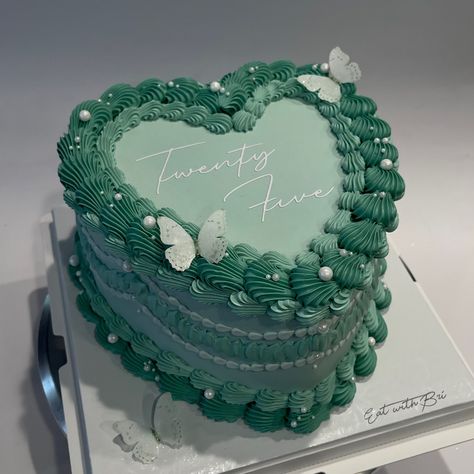 I absolutely love the look of monochrome cakes & also loving these new butterflies 🤍 (8 inch - regular) . . . . . #vintagecake #monochromecake #mintcake #mintcolorcake #ediblebutterflies #vintageheartcake #heartcake #greencake #greenheartcake Aesthetic Cake Designs Cute, Birthday Cake Ideas For Her, Vintage Heart Cake Green, Sage Green Heart Cake, May Birthday Cake, Green Theme Cake, Green Heart Cake, Bday Theme Ideas, 8 Inches Cake