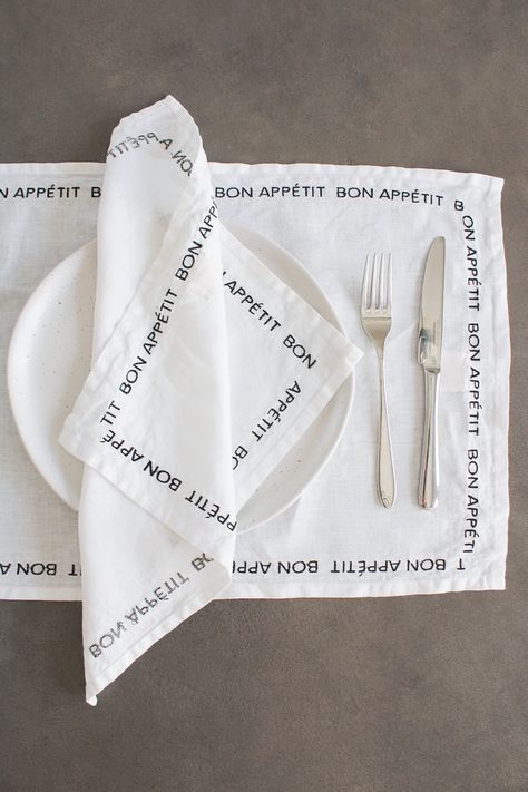 Make your meals extra special with our favourite Embroidered hand drawn lettered Napkins in 100% linen. Mix and match this set of four napkins with our embroidered placemats for the ultimate tablescape. 35cm x 35cm 100% White Linen with Black Embroidery Cold hand wash Embroidered Placemats, Tea Soap, Embroidered Napkins, Napkin Design, Food Poster Design, Stationary Design, Black Embroidery, Food Poster, Table Napkins