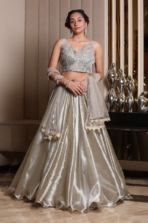 Silver Organza Tissue Lehenga With Embroidered Top And Ruffle Dupatta. Latest Sangeet Outfits, Sangeet Dresses, Tissue Lehenga, Long Frocks For Women, Long Skirt Top Designs, Grey Lehenga, Ruffle Dupatta, Sangeet Ceremony, Cotton Short Dresses