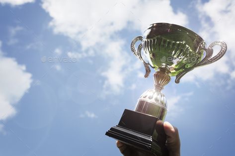 Holding up a trophy cup as a winner by BrianAJackson. Celebrating with trophy award for success or first place sporting championship win#winner, #BrianAJackson, #Celebrating, #Holding Nada Surf, Vision Board Images, Trophy Cup, Greek Gods And Goddesses, Visual Board, Vision Board Inspiration, Trophies & Awards, Business Photos, Camp Half Blood