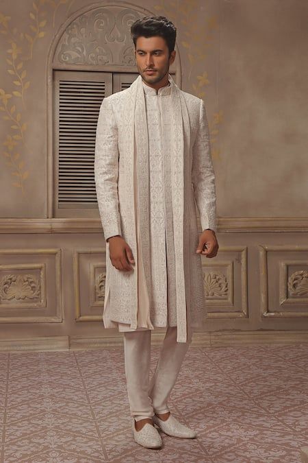 Buy Beige Raw Silk Embroidered Sherwani Set For Men by Vanshik Online at Aza Fashions. Luxury Off White Chanderi Sherwani, Luxury Off White Sherwani With Naqshi, Luxury Sherwani With Intricate Embroidery, Luxury Off-white Sherwani For Wedding, Designer Luxury Embellished Sherwani, Luxury Designer Embellished Sherwani, Dupatta Border, Embroidered Sherwani, Embellished Buttons