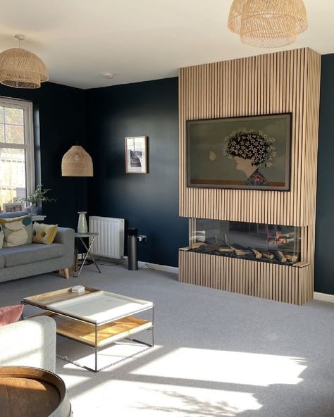 Wood Paneling Living Room, Fireplace Accent Walls, Tv Above Fireplace, Fireplace Inspiration, Dark Blue Living Room, 90s Home, Dark Blue Walls, Timber Slats, Acoustic Panel