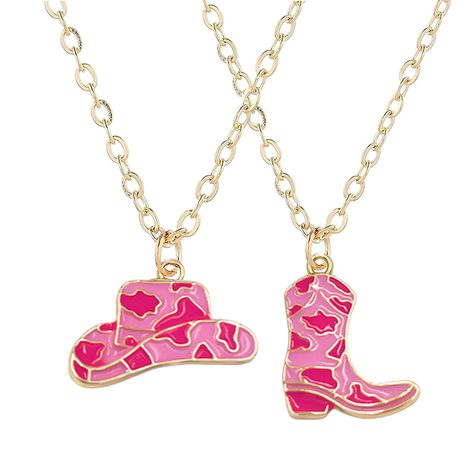 PRICES MAY VARY. Charming Cowgirl: Embrace the cowgirl spirit with our Cowgirl Boots and Hat Pendant Necklace, a delightful set of two necklaces featuring iconic cowgirl symbols. Durable Enamel Pendant: Each necklace showcases a meticulously crafted enamel pendant, depicting a cowgirl's hat and boots, ensuring both style and durability. Perfect for Cowgirls: Tailored for cowgirls and Western enthusiasts, this necklace set adds a touch of country charm to your outfit, making it ideal for casual o Cowgirl Christmas List, Cute Cowgirl Hats, Cowgirl Things, Cute Cowgirl Outfits, Cowgirl Gifts, Country Jewelry, Two Necklaces, Cowgirl Jewelry, Shrink Plastic