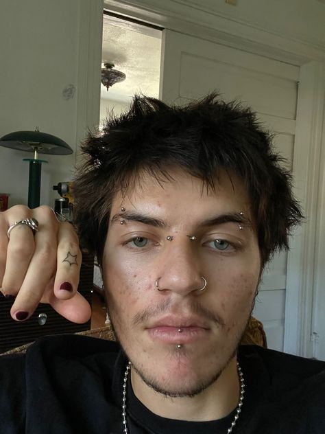 Guys With Facial Piercings, Piercings Men Nose, Men’s Facial Piercings, Male Facial Piercings, Nose Bridge Piercing Men, Mens Face Piercings, Vertical Labret Piercing Men, Mens Eyebrow Piercing, Men With Facial Piercings