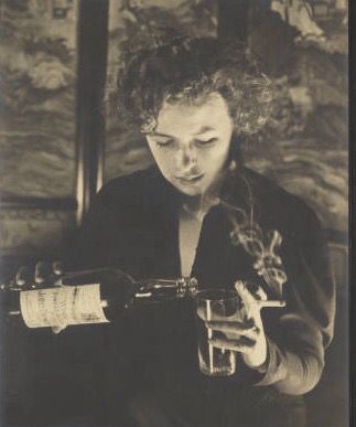 "Woman Pouring Glass Of Wine," vintage photo by Elias Victor Sassoon, 1936z Female Bartender, Women Drinking Wine, Story Illustration, 1950s Woman, 1950s Women, Drunk Woman, Pouring Wine, Hand Photo, Woman Wine