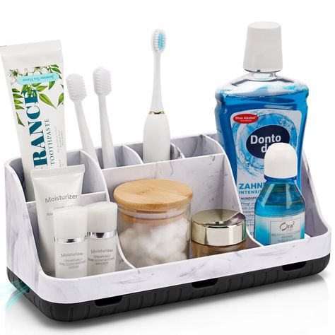 PRICES MAY VARY. SUPERIOR ORGANIZATION: The marble bathroom countertop organizer is designed with 2 tiers and 7 slots for large space. The layered divider design can separately organize bathroom accessories such as electric toothbrush, toothpaste, cosmetics, mouthwash, razor and dental floss. DETACHABLE & EASY TO CLEAN: When you need to clean it, detach the base of the marble toothbrush holder and use soapy water or water to clean the inside, simple and efficient. Bathroom organizer storage size Marble Bathroom Countertop, Bathroom Countertop Organization, Bathroom Toothbrush Storage, Kids Bathroom Organization, Bathroom Countertop Storage, Bathroom Vanity Organization, Bathroom Countertop Organizer, Accessories Organization, Bathroom Counter Organization