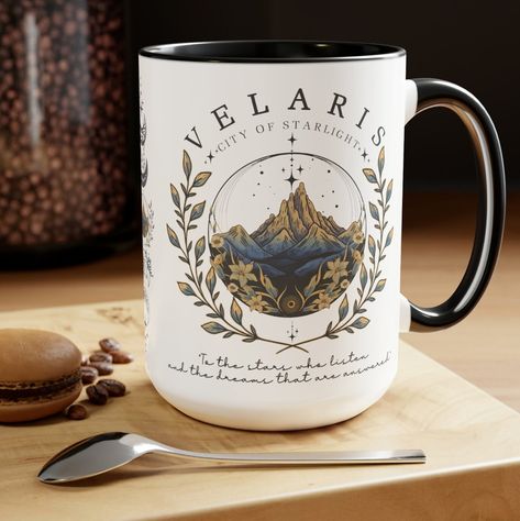 Velaris Mug 15 oz ACOTAR mug, Sarah J Maas Mug, Velaris Coffee Mug, gift for sjm lover, acomaf, acowar, acosf, SJM mug Here to bring big gulps of coffee and style, these two-tone coffee mugs help people around the world start the day just right. Choose between 5 different color options to best complement your designs. Each mug comes with a colored handle, a colored interior, and a classy, glossy finish so that your mugs become an instant favorite.  .: Material: 100% ceramic .: One size: 15oz (0.44 l) .: Lead and BPA-free .: Glossy finish .: Interior and handle available in 5 colors Acotar Coffee Mug, Velaris Mug, Acotar Pottery, Acotar Mug, Acotar Gifts, Blue Star Sapphire Ring, Night Court, Custom Book, Coffee Design