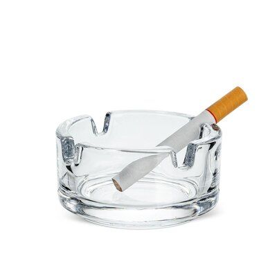 Some classics never go out of style like this simple round ashtray. Made of clear glass with four smooth notches, this elegant ashtray comes in handy whenever you're entertaining diverse groups of people, smokers included. | Mr. MJs Round Ashtray, Size 2.5 H x 2.5 W x 2.5 D in | Wayfair Groups Of People, Ash Tray, Ashtrays, Stage Design, Christmas Storage, Gift Card Sale, Go Out, Out Of Style, Colored Glass