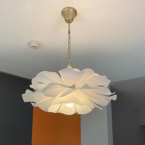 It is a pendant light. The light is very modern and sleek. It is made of acrylic and has a white gold color. The light is hangs from the ceiling with a chain or cord. The light is 14 inches tall and the fixture is 21.5 to 23.5 inches wide. The canopy is round and 4.5 inches wide. The light takes 2 bulbs that are not included. The light can use LED, incandescent, or fluorescent bulbs. The light is for 110v-120v or 220v-240v.The product's size is 21.5"x23.5". The fixture width and height are 21.5" Flower Ceiling Light Fixture, Flower Light Fixture, White Lotus Flower, Latest Living Room Designs, Flower Bedroom, Acrylic Flower, Diy Lamp Shade, Hanging Ceiling Lights, Giant Flowers