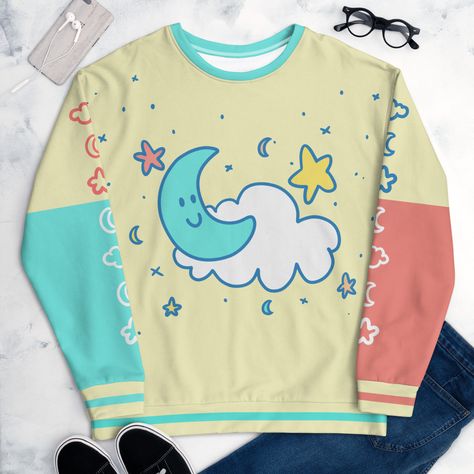 This whimsical and comfy sweatshirt features a one of a kind hand drawn cartoon by Jess Castle with a cute moon, star, and cloud accent on the sleeves! Who says you have to grow up anyway? Show off your playful and kawaii side with this unique design! Want this design on a hoodie? Check it out here - https://etsy.me/3EvcVnD What about a t-shirt? https://etsy.me/3xFhUhU * 70% polyester, 27% cotton, 3% elastane * Fabric weight: 8.85 oz/yd² (300 g/m weight may vary by 2% * Soft cotton-feel face * Brushed fleece fabric inside * Unisex fit Cute Pastel Aesthetic, Aesthetic Kidcore, Stars Sweater, Silly Clothes, Concept Clothing, Funky Outfits, Cute Pastel, Star Sweater, Little Outfits