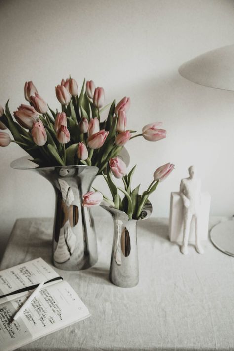 Bloom Botanica is a series of stainless steel vases shaped like an open flower, designed by Danish designer Helle Damkjær as a tribute to Bloom Bowl, a Georg Jensen piece made 20 years ago. Discover more form Georg Jensen! Scandinavian Spring Decor on the dining table. #georgjensen #minimaldesign #homedecor #candleholder #weddinggiftidea #springdecor #scandinavianliving Spring Design Ideas, Scandinavian Design House, Scandinavian Spring, Bohemian Style Interior, Open Flower, Minimalist Interior Style, Minimalist Flowers, Vase Shapes, Spring Design