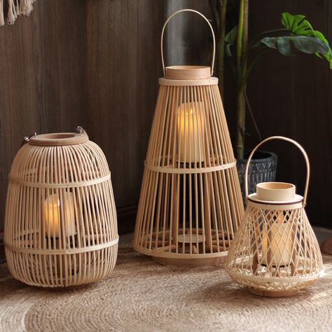 Bring life to your space with this Bamboo Candlestick Floor Lantern. Crafted from sustainable bamboo, this unique lantern features a smooth finish and intricate design, perfect for any décor. This sustainable and long-lasting candle lantern will make a statement in any home decor and setting. Bamboo Candle Holder, Floor Lanterns, Glow Crafts, Bamboo Candle, Floor Lantern, Sustainable Home Decor, Faux Candles, Bamboo Lantern, Outdoor Gathering