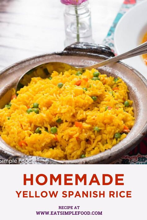 This easy homemade yellow Spanish rice recipe (AKA Arroz Amarillo) is a colorful and versatile side dish with peas and carrots. The yellow rice color comes from the addition of a little bit of saffron or turmeric. Homemade Yellow Rice Recipe, Latin Rice Recipes, Spanish Yellow Rice Recipe Puerto Rico, Best Yellow Rice Recipe, Diy Yellow Rice, Spanish Rice With Corn, Yellow Spanish Rice Recipe, Yellow Rice With Vegetables, How To Make Yellow Rice