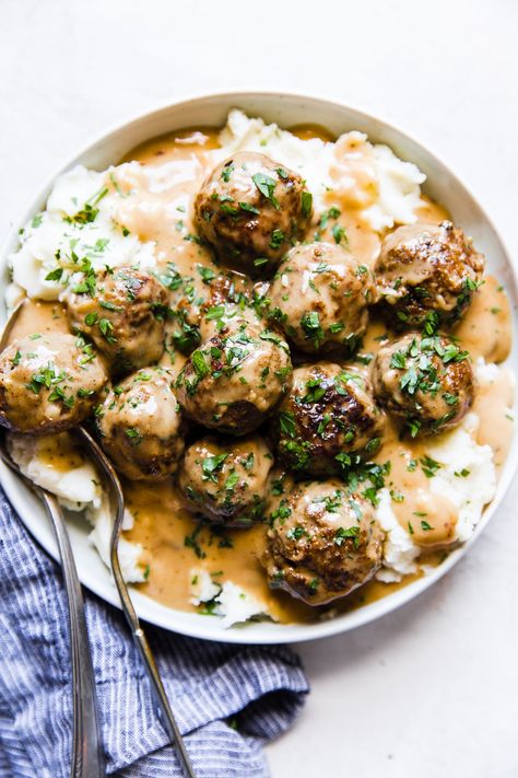 Best Swedish Meatball Recipe by The Modern Proper. These Swedish meatballs are the best you'll ever have. Gently warmed with Swedish spices and covered in a heavenly creamy gravy sauce! Best Swedish Meatball Recipe, Swedish Meatball Recipe, Easy Swedish Meatball Recipe, Norwegian Recipes, Swedish Meatballs Easy, Meatball Dinner, The Modern Proper, Meatball Sauce, Modern Proper