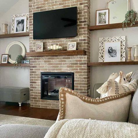 22 Innovative Living Room TV Wall Ideas With Style Mantel On Brick Fireplace, Floating Shelves Living Room Fireplace, Brick Fireplace With Tv Above, Living Room Tv Wall Ideas, Room Tv Wall Ideas, Above Fireplace Ideas, Brick Chimney Breast, Tv Above Fireplace, Tv Wall Ideas