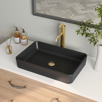 Being made from high-quality ceramic with a seamless and sleek design makes the modern white countertop ceramic rectangular bathroom vessel sink extremely durable. Its surface is scratch and stain-resistant and is easy to maintain with regular cleaning. With a rectangular design and glossy surface, this vessel sinks easily and updates any traditional, transitional, or contemporary bathroom. Sink Finish: Matte Black | DeerValley Ally 20" Ceramic Rectangular Vessel Bathroom Sink in Black, Size 4.3 Black Vessel Sink Bathroom, Black Half Bathroom, Black Sink Bathroom, Rectangular Vessel Sink, Half Bathroom Decor, Vessel Sink Vanity, White Countertop, Unique Bathroom Vanity, Rectangular Bathroom