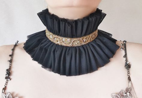 Rococo style hold trimming collar with ruffles for Photoshoot Model or Party, tulle beaded high choker in black with beautiful beaded trimming by Elyseeart. Unique stage costume high neck collar. ♥ Materials: hand sewn layered high quality soft tulle fabric, Rococo style beaded trimming in beautoful shades of antique gold-bronze. Adjustable on neck circle with tulle ties. Each ruffle is hand sewn. *non scratchy tulle, soft and friendly on skin for many hours. *non itchy tulle One size fits all. Queen Photoshoot, Costume Collar, Ruff Collar, Photoshoot Props, Stage Costume, Black Tulle, Soft Tulle, Rococo Style, Beaded Trim