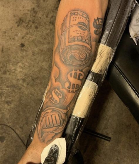 Bag Chaser Tattoo, Money Forearm Tattoo Men, Money Arm Tattoos, Money Chaser Tattoos, Hood Forearm Tattoo Men, Sidearm Tattoo Men, Paper Chaser Tattoo, Hood Tattoo For Men Forearm, Black People Tattoos Men