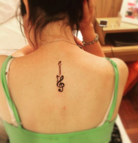 Treble clef/ guitar tattoo. Love, love LOVE my tattoo Music Tattoo Ideas For Men, Treble Clef Tattoos, Nashville Tattoos, Tattoos For Music Lovers, Quotes Tattoos Ideas, Clef Tattoo, Music Lover Tattoo, Music Quote Tattoos, Treble Clef Tattoo