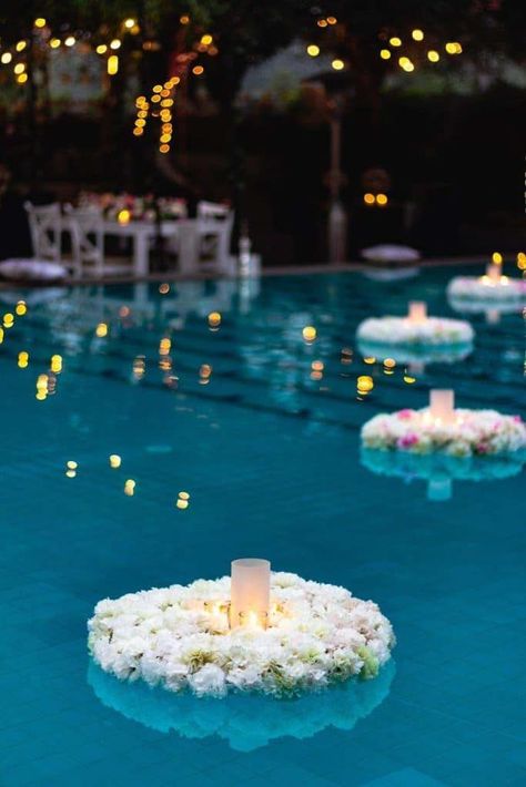 Light up the pool during your outdoor party and enjoy its magical vibe! Make floaters and use that to place candles and lanterns. Beautiful! Read our post for more lighting ideas for a cozy outdoor party! Wedding Pool Party Decorations, Pool Wedding Decorations, Pool Candles, Wedding Pool Party, Outdoor Party Lighting, Pool Wedding, Outdoor Dinner Parties, Poolside Party, Pool Party Decorations