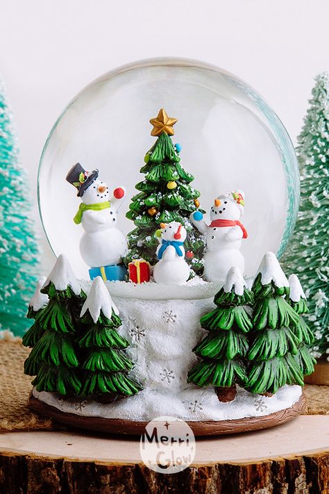 Snowman and his family decorates their christmas tree in the winter snow. --- Follow our Instagram @merriglow_official Cake Reference, Englebert Humperdinck, Snowman Snow Globe, Fantastical Creatures, Christmas Snow Globe, Snowman Family, Christmas Tree Set, Mele Kalikimaka, Christmas Snow Globes