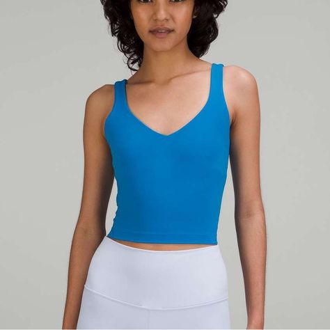 This Nwt Lululemon Align Tank Size 8 In Poolside Is Perfect For A Casual Day Or A Workout! Rare Color And Style, Sold Out Made In Vancouver Machine Wash Size 8 Thrifted By Daveena Strives To Sell Good Thrifted Clothing. All Items Are Washed Before They Are Shipped, And Orders Ship Between 1-3 Days. Questions? Ask In The Comments! Tags: Lululemon, Brand New, Athletic, Athleisure, Yoga, Comfy, Comfortable Align Tank Top, Align Tank, Lululemon Align Tank, Lululemon Tank Top, Lululemon Tops, Yoga Tank Tops, Top Shirt Women, Lululemon Tank, Lululemon Align