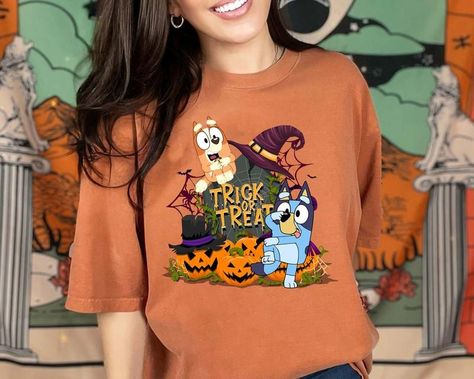 Bluey Trick Or Treat Halloween Shirt, Spooky Season Sweatshirt, Bluey Halloween Shirt, Trick Or Treat Shirt Bluey Halloween, Halloween Jumper, Tiktok Shop, Halloween Treats, Spooky Season, Halloween Shirt, Trick Or Treat, Jumper, Shirt Designs