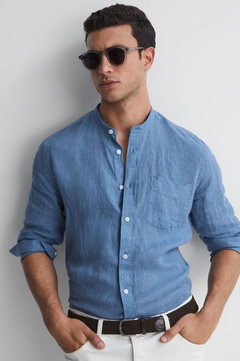 Nothing speaks to summer style more than linen, and the Ocean shirt is no exception. Keeping things traditional, it features a button closure and a chest pocket. The hemline is curved for a suave un-tucked look. Wear with tapered trousers and espadrilles for unstudied cool. 100% linen Grandad collar Long sleeves Front button closure Patch pocket to chest Curved hemline Grandad Collar Shirt, Blue Linen Shirt, Ocean Shirt, Air Force Blue, Mens Linen, Tapered Trousers, International Fashion, Collar Shirt, Button Placket