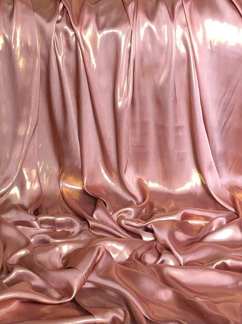 "Shimmer satin fabric :- shiny wet look satin fabric  pearl peach in colour  its colour is pearl peach and has gold shimmer on it width is 58\" inches(147cm) soft feel medium weight smooth shiny fabric  can be used for multiple projects dresses,crafts,wedding,upholstery,bedding,table tops ,curtains,costumes, cushions etc this price is for one meter and if you will buy more than one meter it will come as one continuous length  please note that we try our best to get the actual colour of the fabri Upholstery Bed, Shiny Fabric, Craft Wedding, Dress Crafts, Wet Look, Gold Shimmer, Dress Evening, Table Tops, Bridal Dress