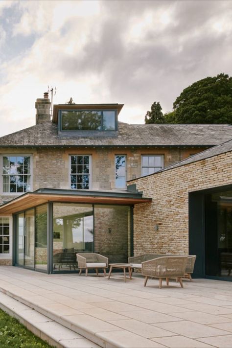 slim framed sliding glass doors in a modern extension in Yorkshire Modern Glass Extension On Old House, Kitchen In Glass Extension, Old And New House Extension, Modern Extension To Old House, Georgian House With Modern Extension, Glass Wall Extension, Modern Extensions To Old Houses, Flat Roof Glass Extension, Contemporary Extension On Old House