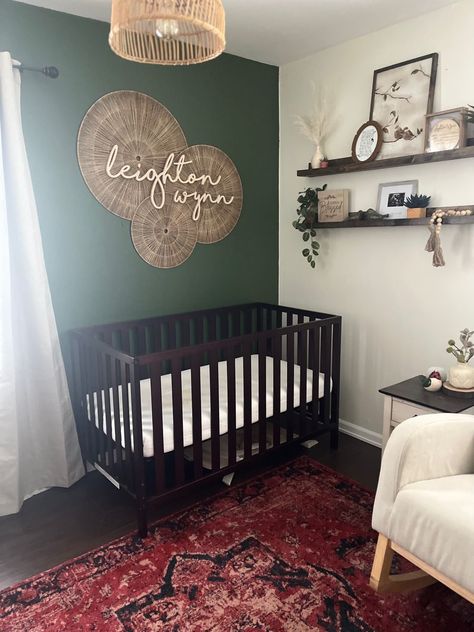 Dark Green And Beige Nursery, Gender Neutral Nursery With Dark Wood Crib, Green Nursery With Dark Furniture, Green And Dark Wood Nursery, Dark Green Baby Girl Nursery, Forest Green Accent Wall Nursery, Dark Floor Nursery, Deep Green Nursery, Dark Nursery Furniture