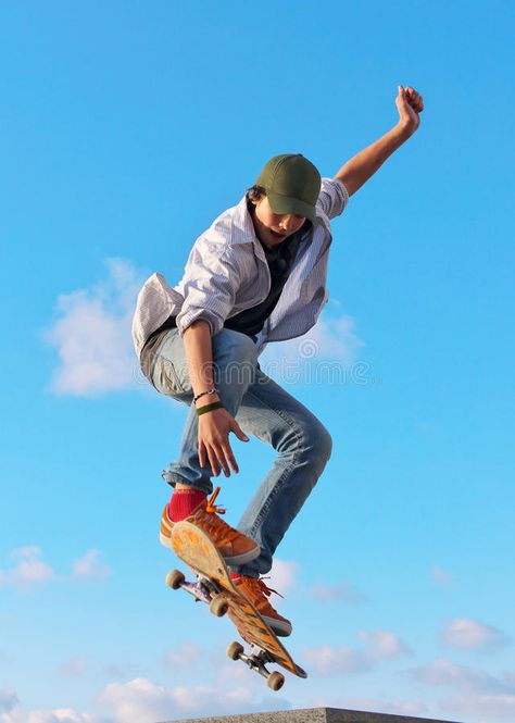 Skateboarder hand up. Skateboarder jumps in town park on background sky with clo , #spon, #jumps, #town, #Skateboarder, #hand, #sky #ad Skater Poses, Jumping Poses, Sports Photography Tips, Skateboard Photography, Drawing Body Poses, People Poses, Human Reference, Body Reference Poses, Human Poses Reference