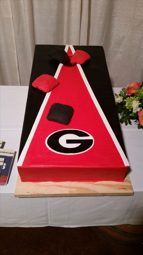 #cornhole grooms cake #UGA Corn Hole Cake Ideas, Cornhole Cake Ideas, Uga Birthday Party Decorations, Uga Grooms Cake, Cornhole Cake, Uga Cake, Football Grooms Cake, Groomsmen Cake, Groomsman Cake