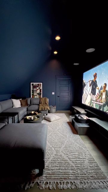 Snug Cinema Room Ideas, Small Room Home Theater, Loft Ideas Upstairs Media Room, Movie Rooms In House Cozy, Blue Cinema Room, Navy Blue Theater Room, Basement Movie Room Paint Colors, Dark Blue Cinema Room, Navy Blue Movie Room