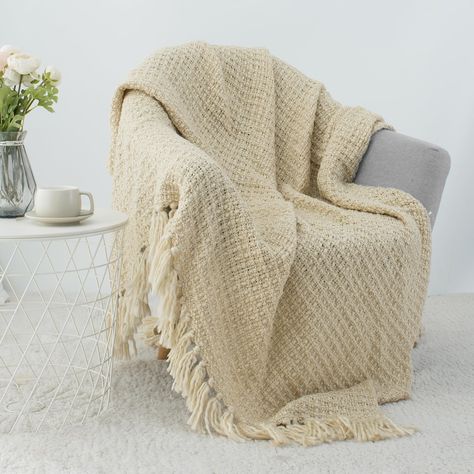 PRICES MAY VARY. Quality Blanket:Our throw blankets made of 100% high-quality acrylic fabric are ultra soft and cozy. The lightweight blanket is fluffy, warm and strong resistance to sunlight, which measures 50" x 60" Knit Design:Special knitted pattern and cute tassel design make this throw blanket easy to match with your home decoration to bring your room a farmhouse touch while adding exquisite and warmth to your living room Versatile Uses:The throw blanket can serve as an outdoor shawl or sc Sofa Shawl Living Rooms, Living Room Throw Blanket, Tan Blanket, Brown Bedroom Decor, Cream Throw Blanket, Cable Knit Throw Blanket, Living Room Blanket, Living Room Throws, Cable Knit Blankets